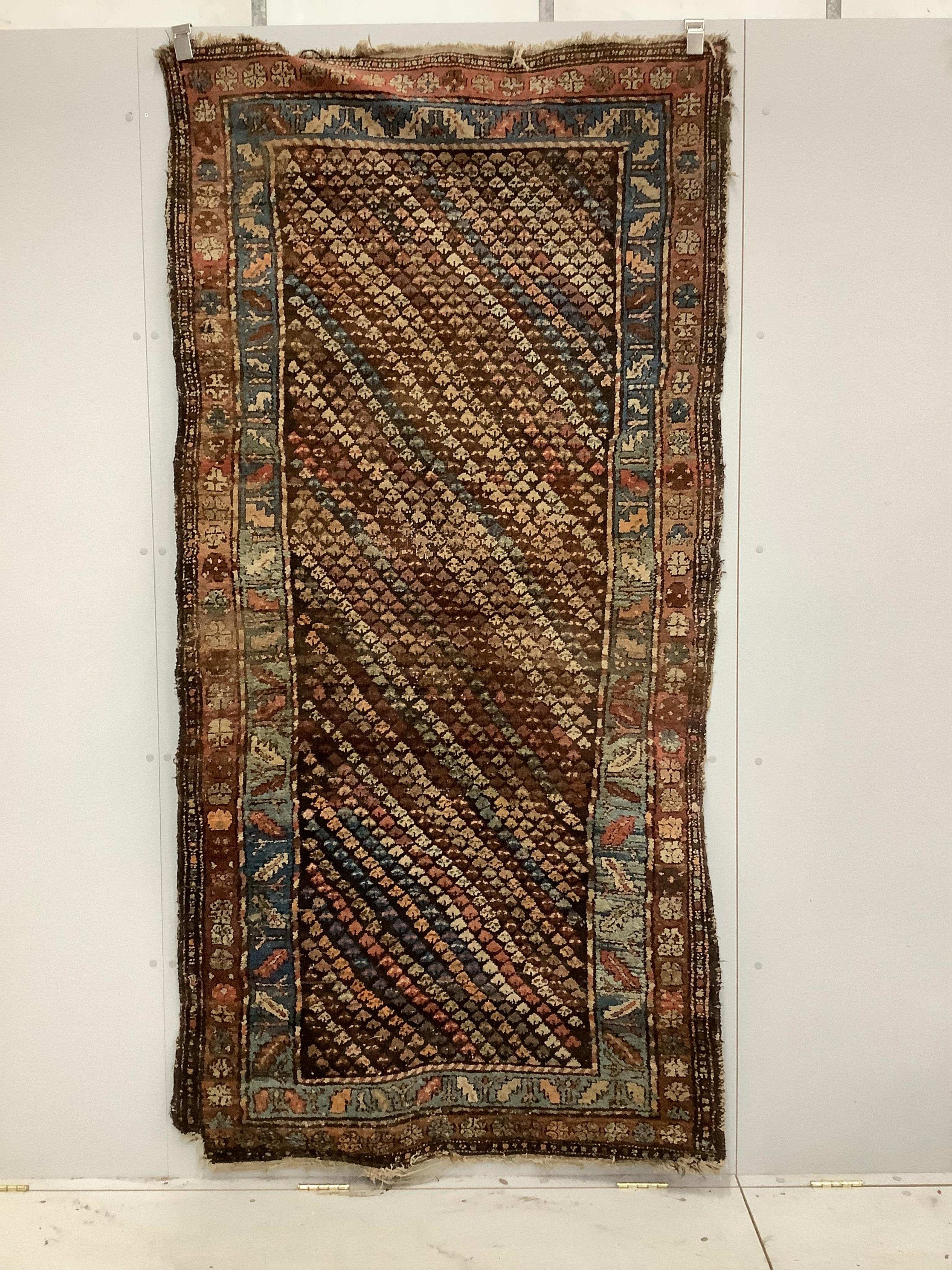 A Caucasian rug, 200 x 110 and a smaller Belouch rug
